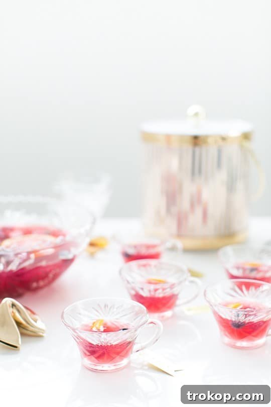 Berry Punch Perfection DIY Brass Drink Markers 15 A glass of Mixed Berry Punch with disco dust sprinkled on top, creating a shimmering, festive effect for a celebration.