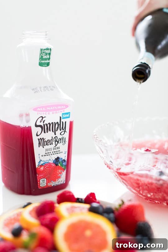 Berry Punch Perfection DIY Brass Drink Markers 7 Close-up of a bottle of Simply Mixed Berry Juice, highlighting its real fruit and natural ingredients, ideal for a delicious punch.