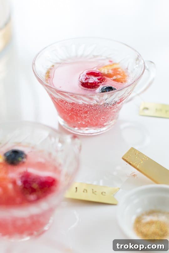 Berry Punch Perfection DIY Brass Drink Markers 10 A close-up of the punch bowl with colorful frozen berry ice cubes, adding both chill and visual appeal to the Mixed Berry Punch.