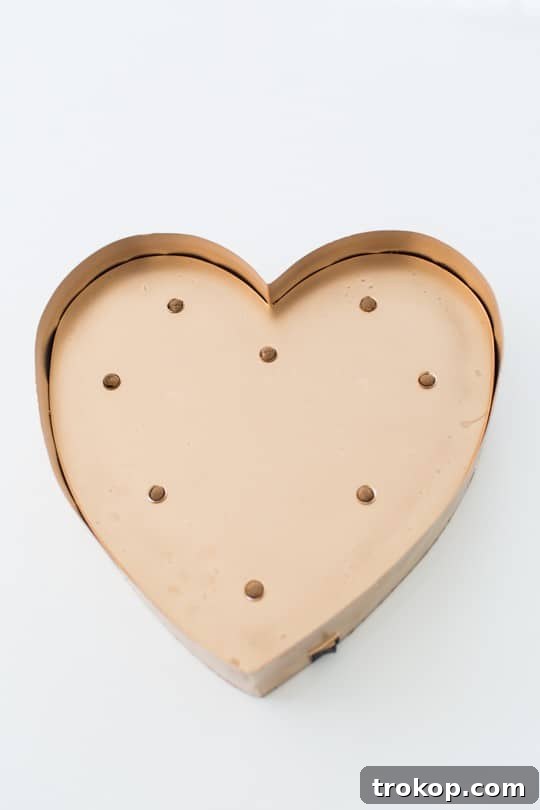 DIY Sparkling Heart Marquee 5 Spray painting the marquee heart