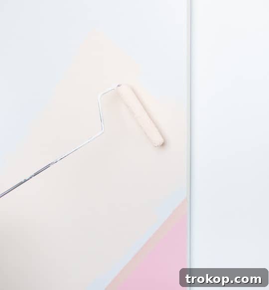 Color block painted barn door, showing diagonal division of two colors.