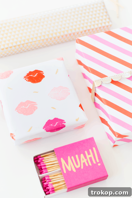 Pucker Up DIY Gift Wrap 3 DIY lip patterned gift wrap - Another close-up of the finished lip pattern gift wrap, featuring multiple colors and gold accents for a luxurious feel.