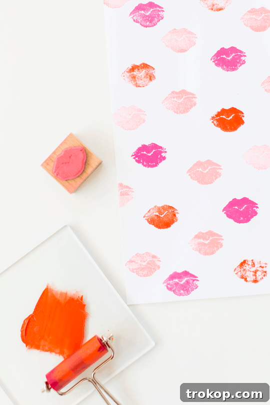 Pucker Up DIY Gift Wrap 7 Multiple colored lip prints stamped onto paper, demonstrating the layering technique with different shades.