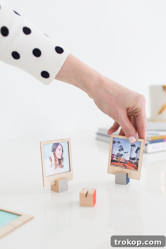 Wooden DIY Photo Display for Cherished Memories 2 DIY Polaroid photos displayed on a wooden stand - a creative way to display Polaroids