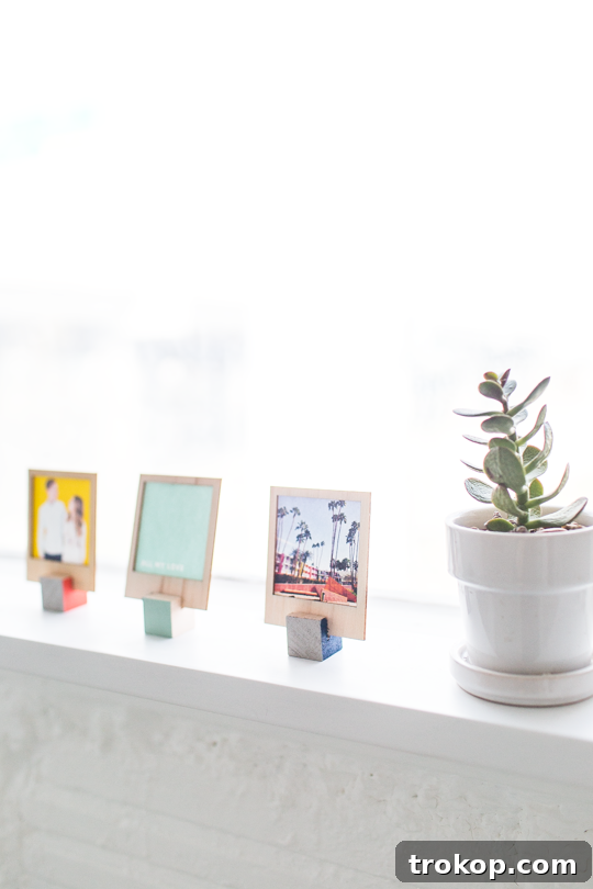 Wooden DIY Photo Display for Cherished Memories 5 Materials needed for DIY wooden Polaroid stands - wood blocks, saw, paint, and brush