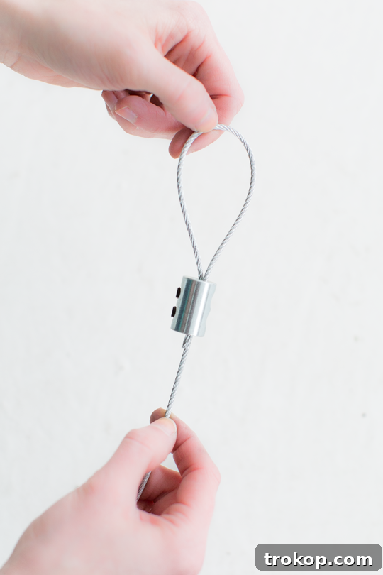 Crafted Cascading Blooms 6 Ensuring even hanging wires for floral installation