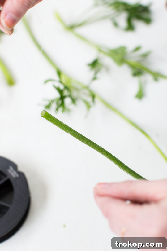 Crafted Cascading Blooms 8 Adding individual flowers to the hanging installation