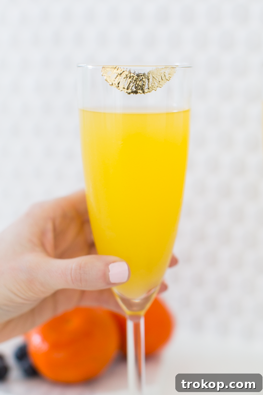 DIY Edible Gold Lipstick Glasses for One-Night Shine 6 Applying Edible Gold Lip Print to Glassware
