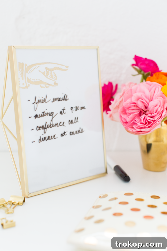 Craft Your Own Erasable Canvas 3 Close-up of a stylish gold geometric picture frame repurposed as a DIY Dry Erase Board.