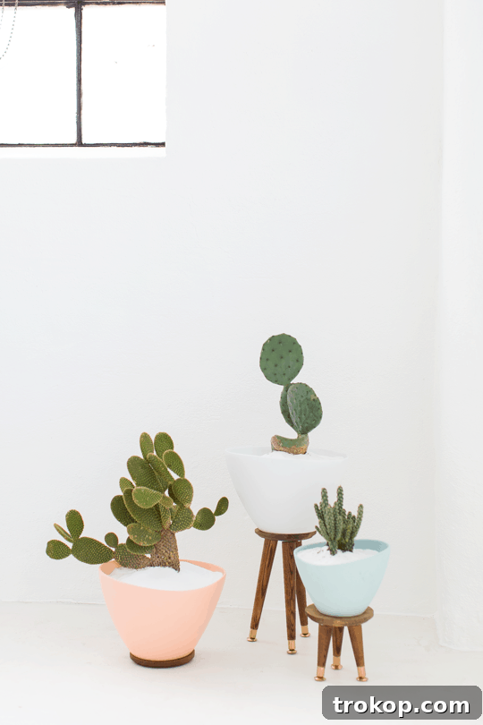 Chic DIY Mid-Century Plant Stands 11 DIY Mid Century Planters without legs. A simpler, quicker, and budget-friendly alternative for modern plant decor.