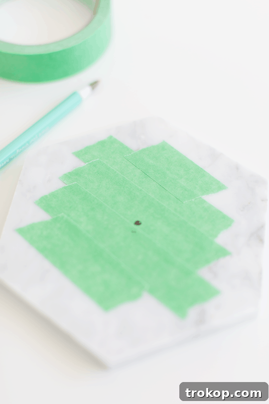 Handcrafted Marble Tabletop Timepiece 5 Marking the center of a marble tile for drilling