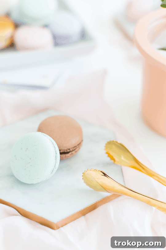 Final arrangement of DIY gilded marble hexagon serving boards on a table, ready for entertaining | sugar & cloth