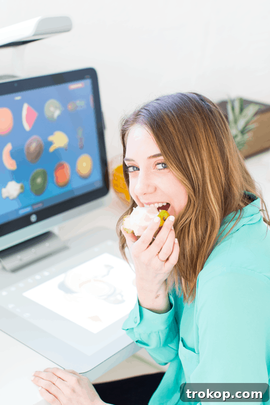 Close-up of the HP Sprout scanning fresh fruit to create digital art.
