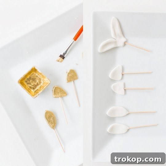 Freshly cut fondant deer ears with toothpicks