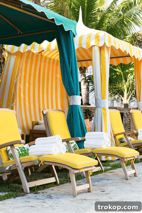 Miami's 24-Hour Adventure 9 Relaxing poolside scene with white lounge chairs