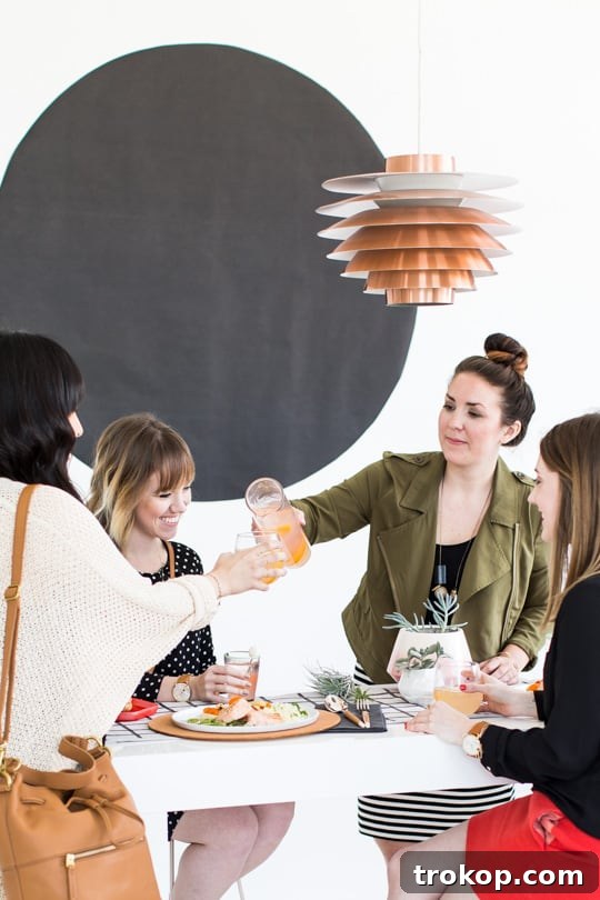 Modern Easter table setting with DIY leather chargers and drinks