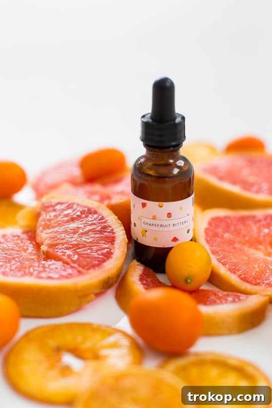 Infuse Your Own Bitters From Cocktails to Desserts 8 Orange bitters next to a cocktail