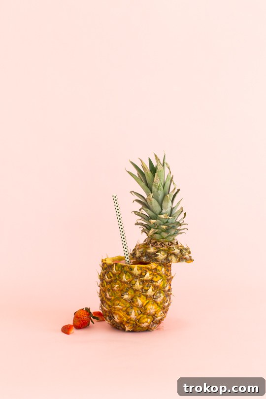 5 Refreshing Infused Water Recipes & DIY Fruit Cups 11 Bright and fruity Strawberry Pineapple Infused Water