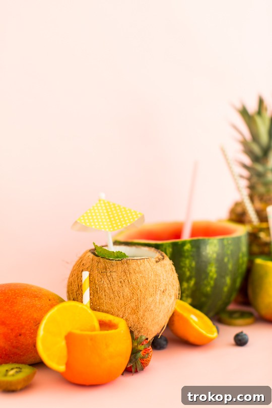 5 Refreshing Infused Water Recipes & DIY Fruit Cups 14 The elegant Soma water filter with its distinct white oak handle, showcasing craftsmanship