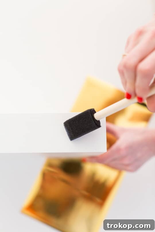 Faux Brass Drawer Facelift 5 Cutting gold foil for DIY drawer fronts