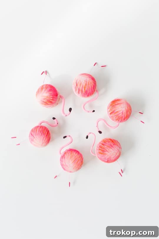 A charming DIY flamingo macaron, freshly decorated and ready to delight