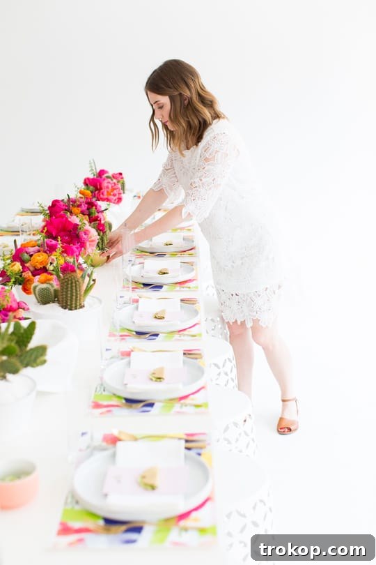 A vibrant cactus-inspired brunch party tablescape with colorful decor