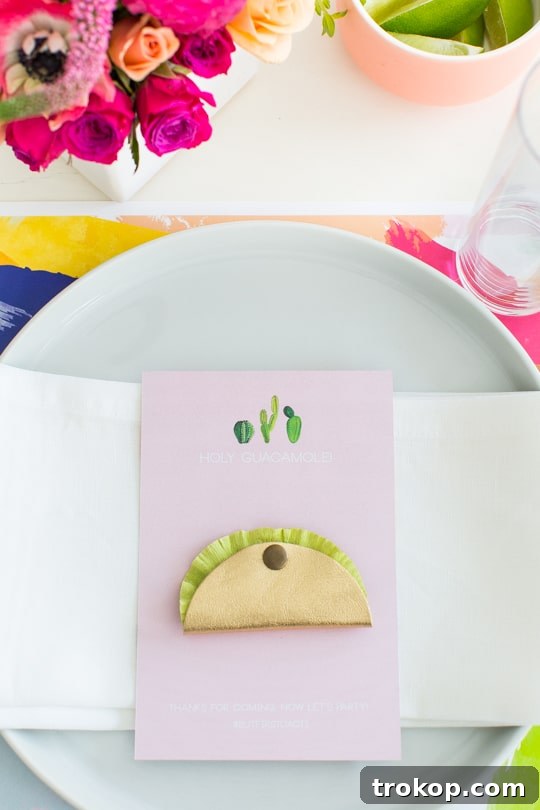 A beautifully set table for a cactus-themed brunch party, with creative placemats