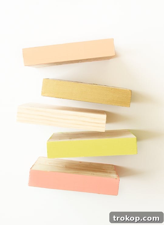 Unpainted wooden boards stacked, ready for DIY project