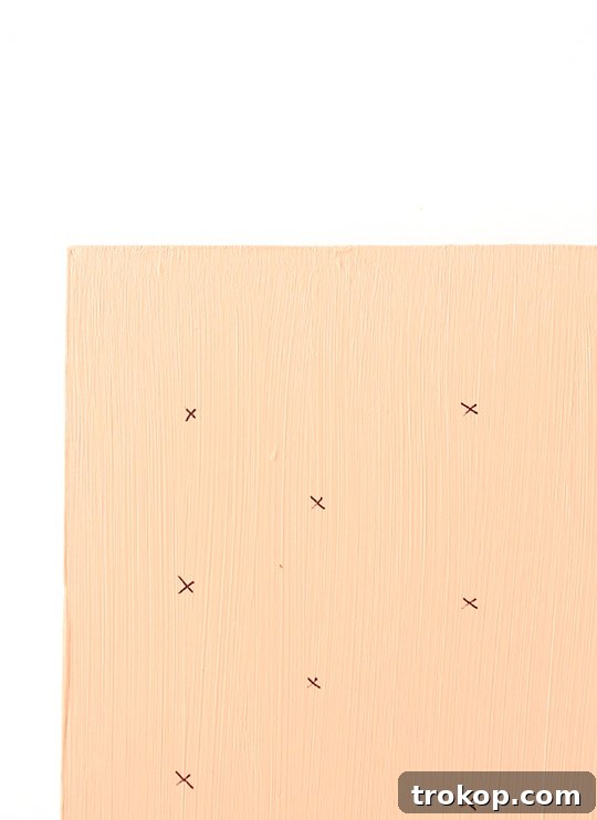 Painting the edges of wooden boards for the DIY cake