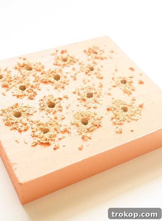 Close-up of painted wooden board edge drying