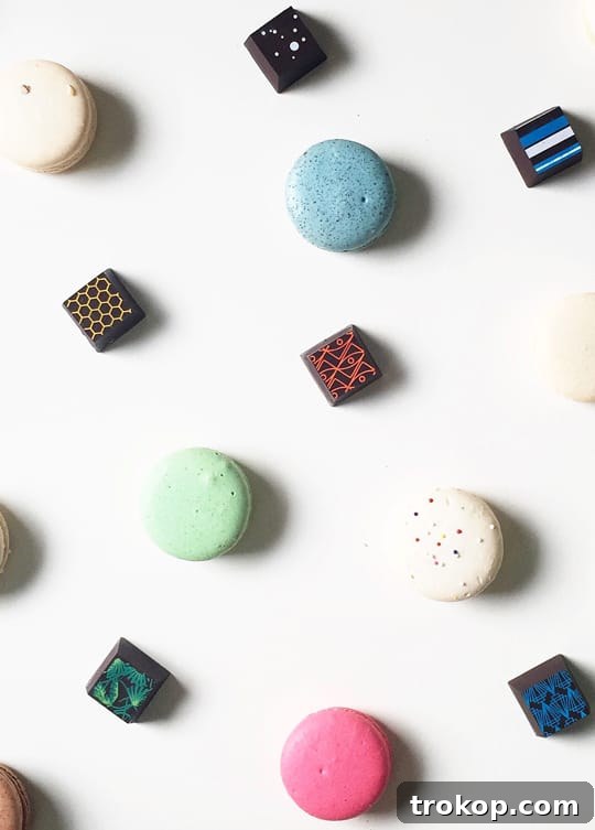 Uncut & Unfiltered: Backstage 6.1 2 Delicious macarons and artisan chocolates artfully arranged on a display