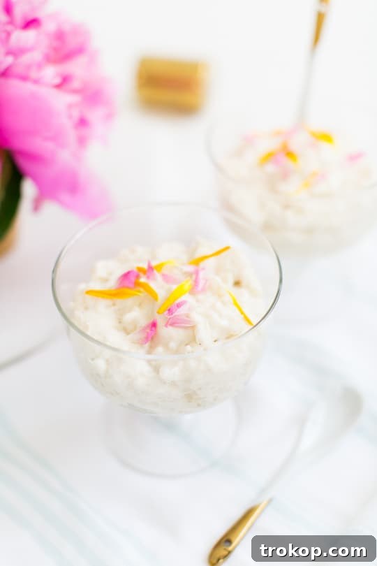 Close-up of vanilla bean tapioca pudding with delicate floral sprinkles, ready to be served