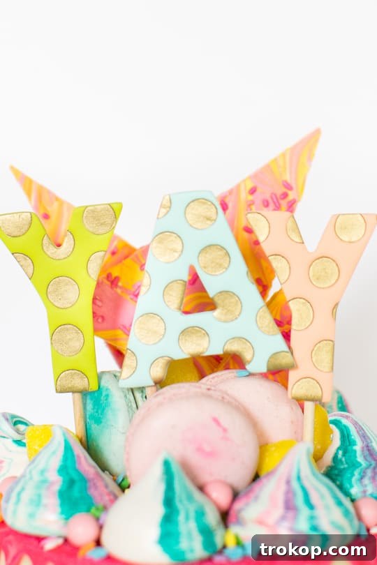 A beautifully frosted layer of the unicorn strawberry cake, showcasing the smooth coconut buttercream.