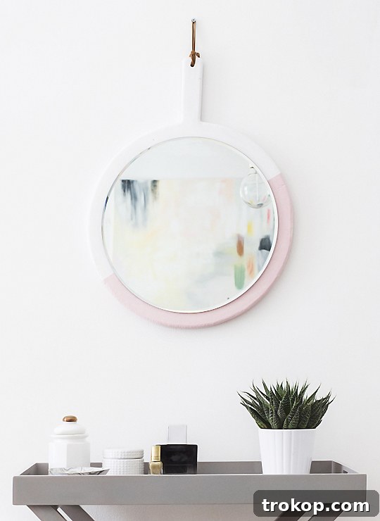 Stylish DIY Color Block Hanging Mirror 2 DIY Hanging Wall Mirror made from a cutting board - Sugar & Cloth