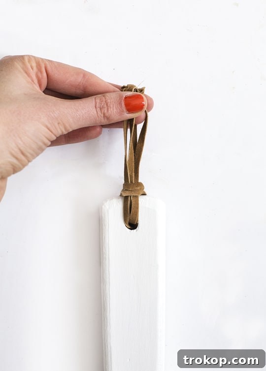 Stylish DIY Color Block Hanging Mirror 7 The finished DIY hanging wall mirror with cord