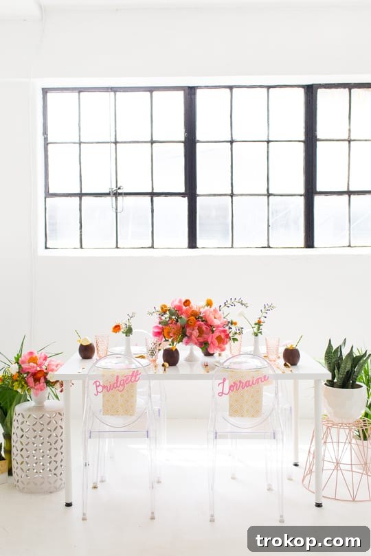 Beautifully styled retro summer party table setting featuring DIY patterned plates, calligraphy menus, and gold flatware. Get vintage table decor ideas.