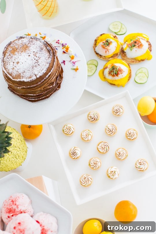 Close-up of a refreshing drink adorned with a DIY striped umbrella, showcasing the fun and easy craft for a Retro Summer Brunch.