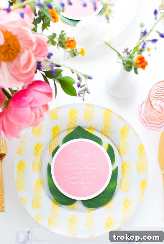 Close-up of delectable raspberry scones and vibrant tiki cocktails, perfect food and drink inspiration for a Retro Summer Brunch party.