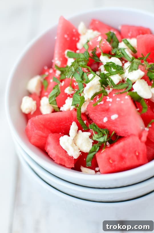 Freshly diced watermelon cubes, a key ingredient for summer flatbreads - Sugar & Cloth
