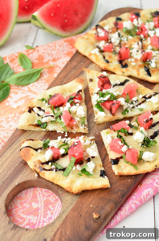 Assembling Watermelon Feta Flatbread with fresh ingredients and balsamic glaze - Sugar & Cloth