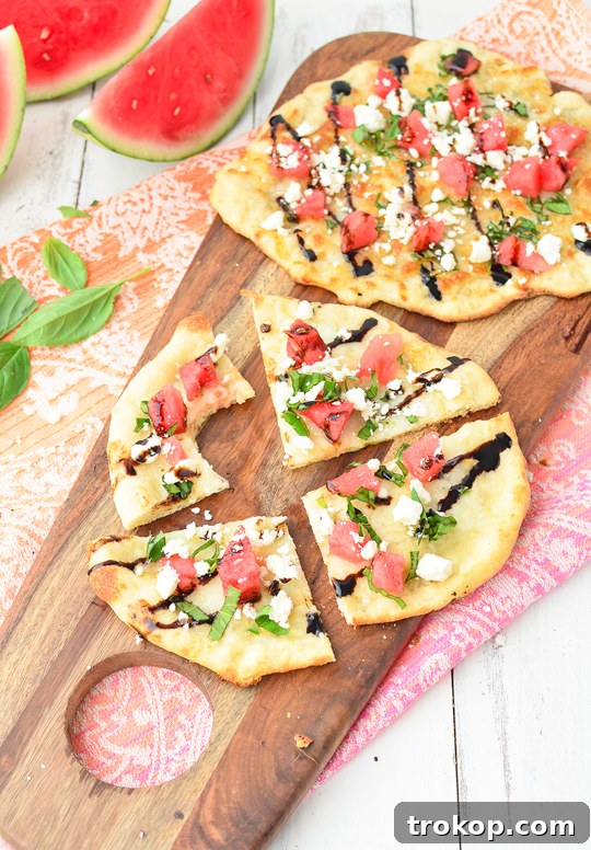 Close-up of Watermelon Feta Flatbread drizzled with balsamic glaze, ready to serve - Sugar & Cloth