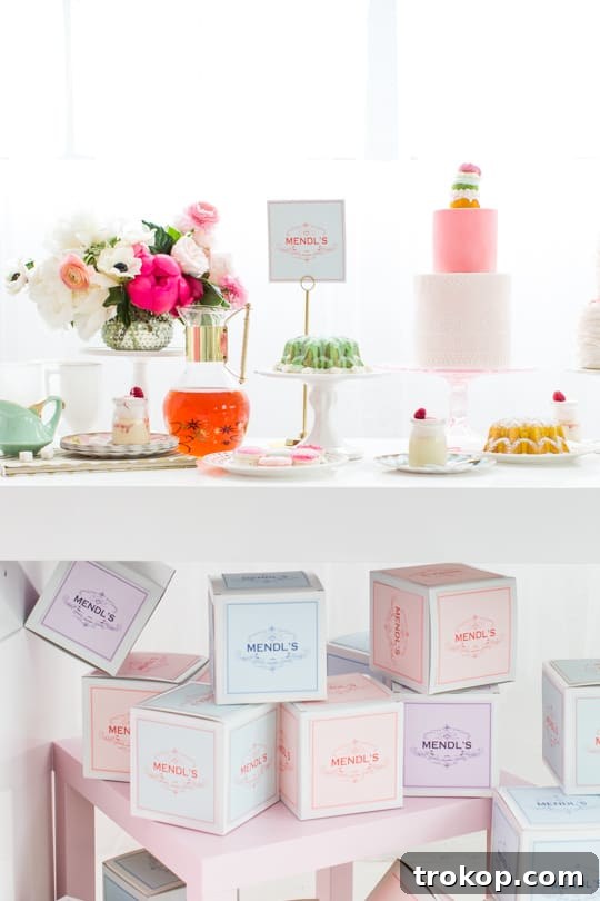 Tiered bundt cakes and other desserts on pink cake stands for a tea party