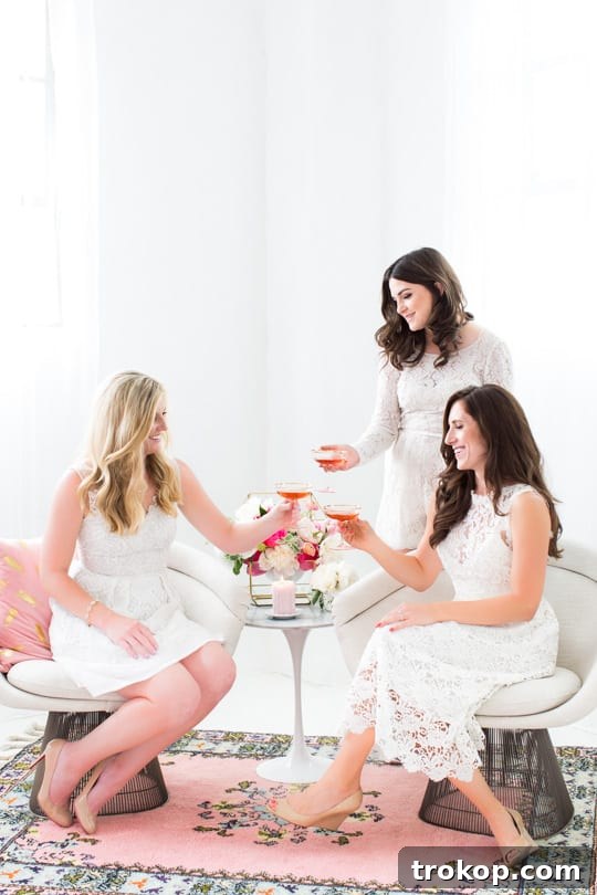 Guests enjoying sweets from Mendl's boxes at a BHLDN tea party