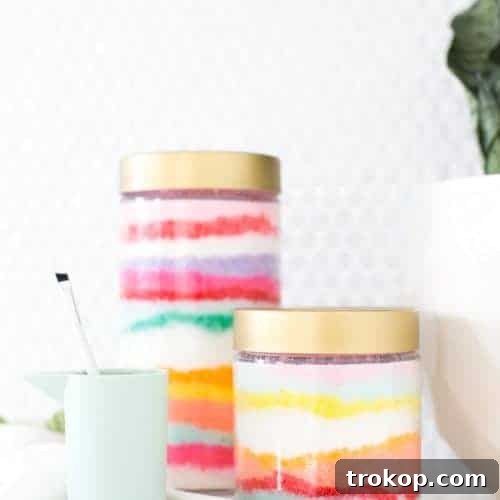 Rainbow Layered Sugar Scrub Craft 12 A beautifully layered Sand Art DIY Sugar Scrub in a clear jar, showcasing vibrant colors and smooth texture, ready to enhance any bathroom aesthetic.
