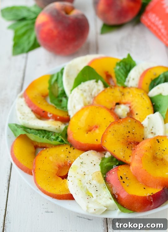 Caprese's Peachy Summer Twist 2 Lush Peach Caprese Salad with ripe peaches, fresh mozzarella, and basil