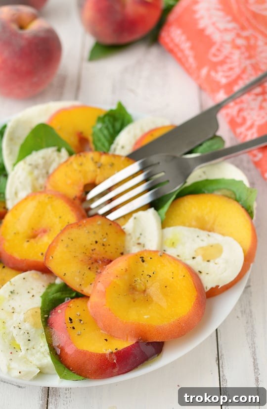 Caprese's Peachy Summer Twist 7 Beautifully stacked Peach Caprese Salad ready to be served