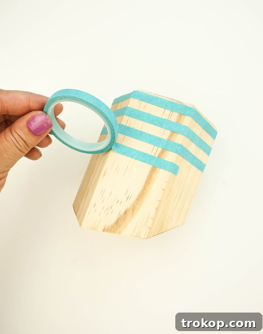 Geometric Desk Organizer Craft 8 Applying tape stripes to hexagonal wooden cups for painting