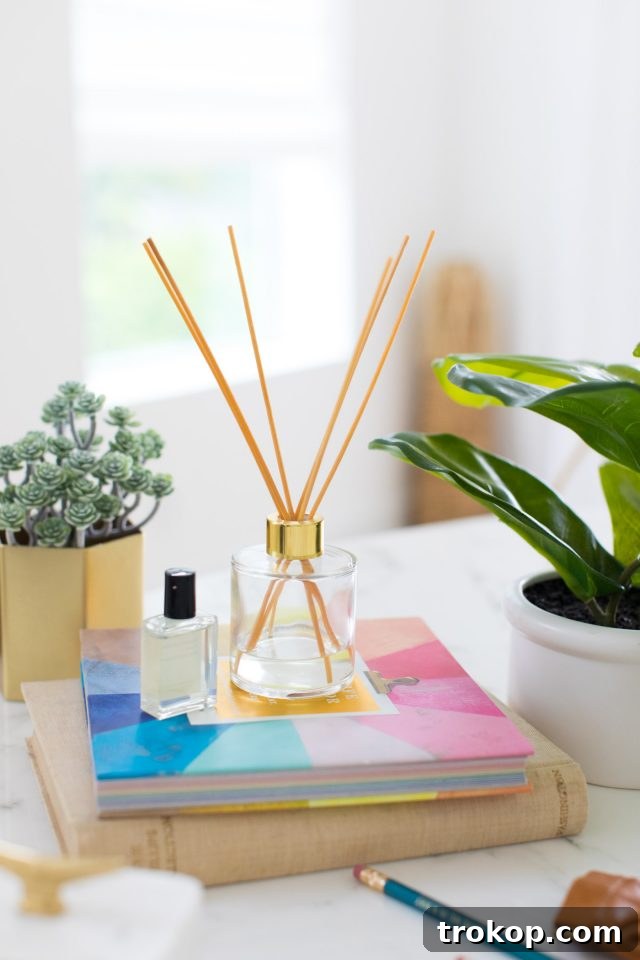 Handcrafted Home Fragrance 8 A close-up of a beautifully crafted DIY reed diffuser by a popular lifestyle blogger, emphasizing homemade charm and natural scents.