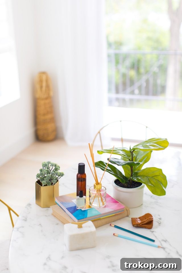 Handcrafted Home Fragrance 9 An array of essential oil bottles and a DIY reed diffuser setup on a styled table, inviting creativity and natural well-being.