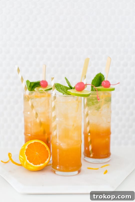 Final presentation of the Esmeralda Fizz cocktail, sparkling and garnished, ready to enjoy.
